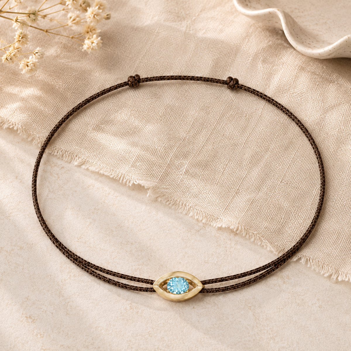 Bracelet cordon Topaze & or jaune 375/1000 – Passion Diamant Platine