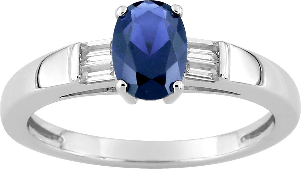 Bague argent rhodié 925/1000 oxydes de zirconium baguette et central bleu foncé 7 x 5 mm