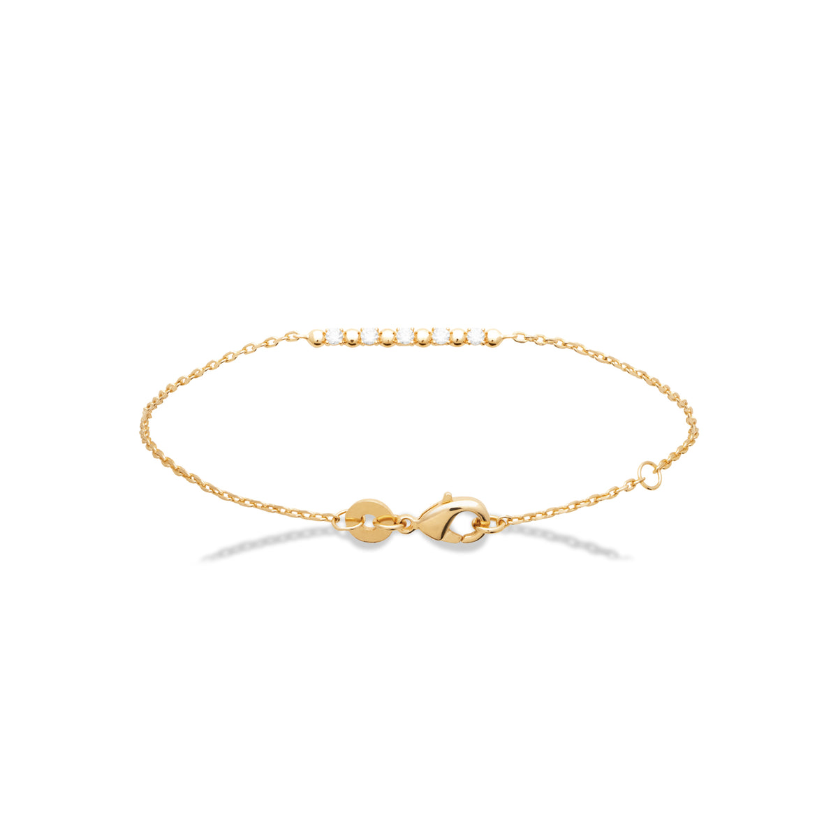 Bracelet en plaqué or avec barre d'oxydes blancs