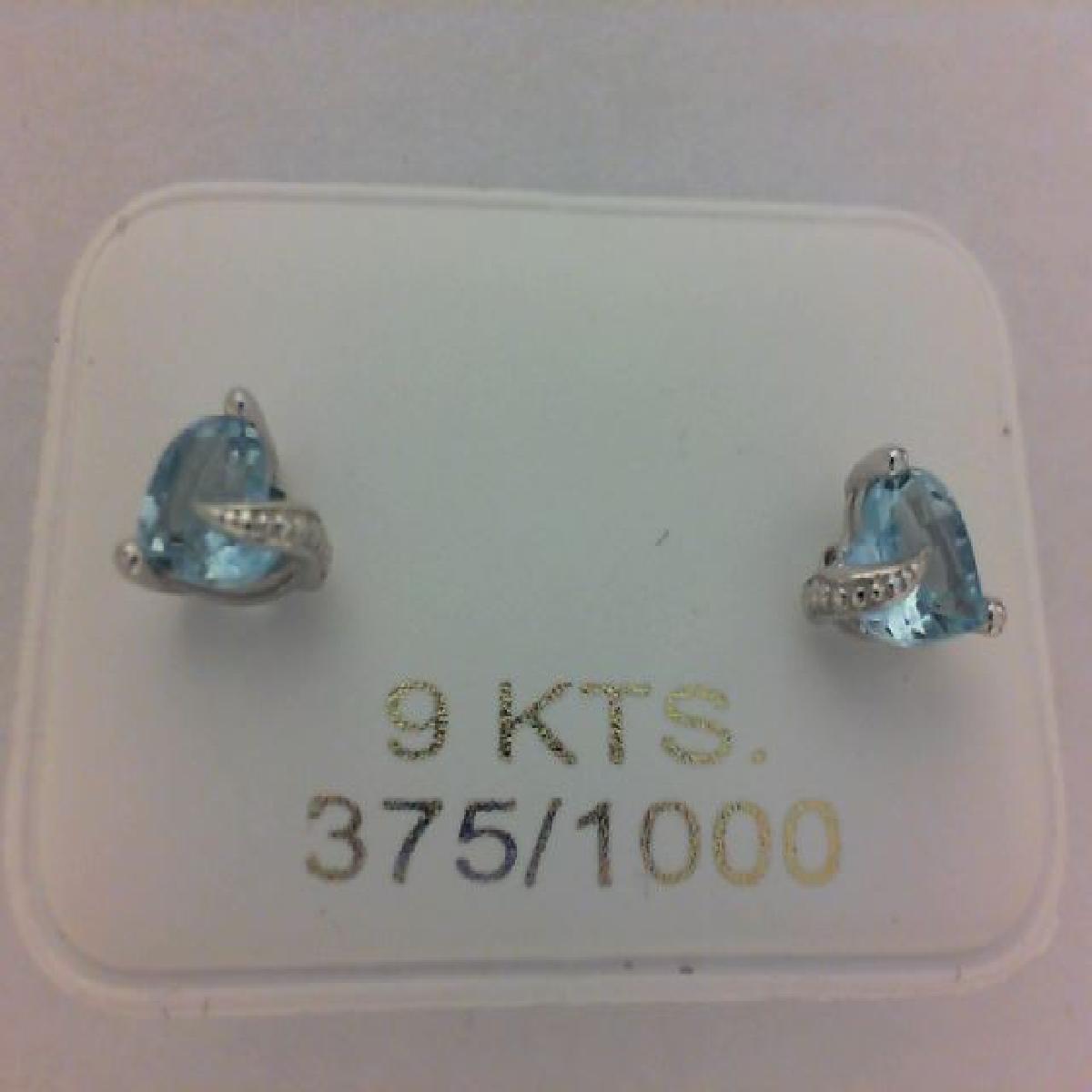 Boucles D'Oreilles Pendantes AU375 – Topaze Bleue Naturelle Facettée Taille 6x4 Mm Sertie