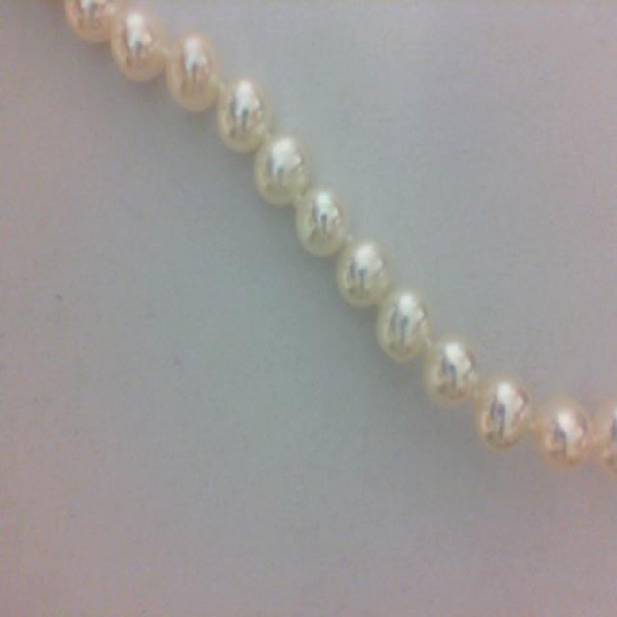 Bracelet en or jaune 750 tour complet de perles de cultures 5.5/6 mm