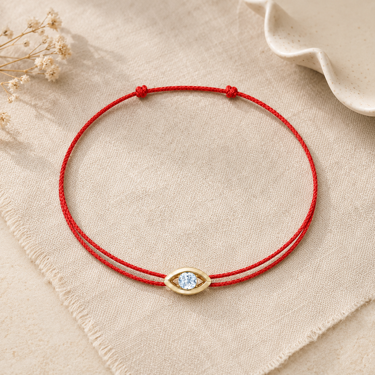Bracelet cordon Aigue-Marine & or jaune 375/1000 – Passion Diamant Platine