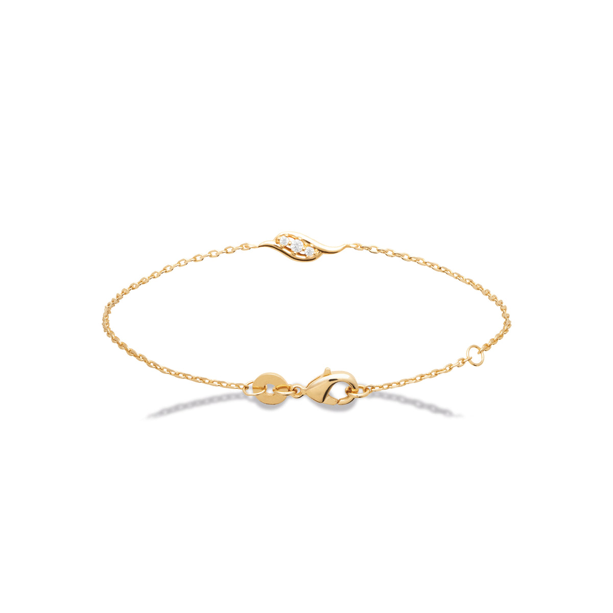 Bracelet en plaqué or avec trois oxydes blancs en forme de vague