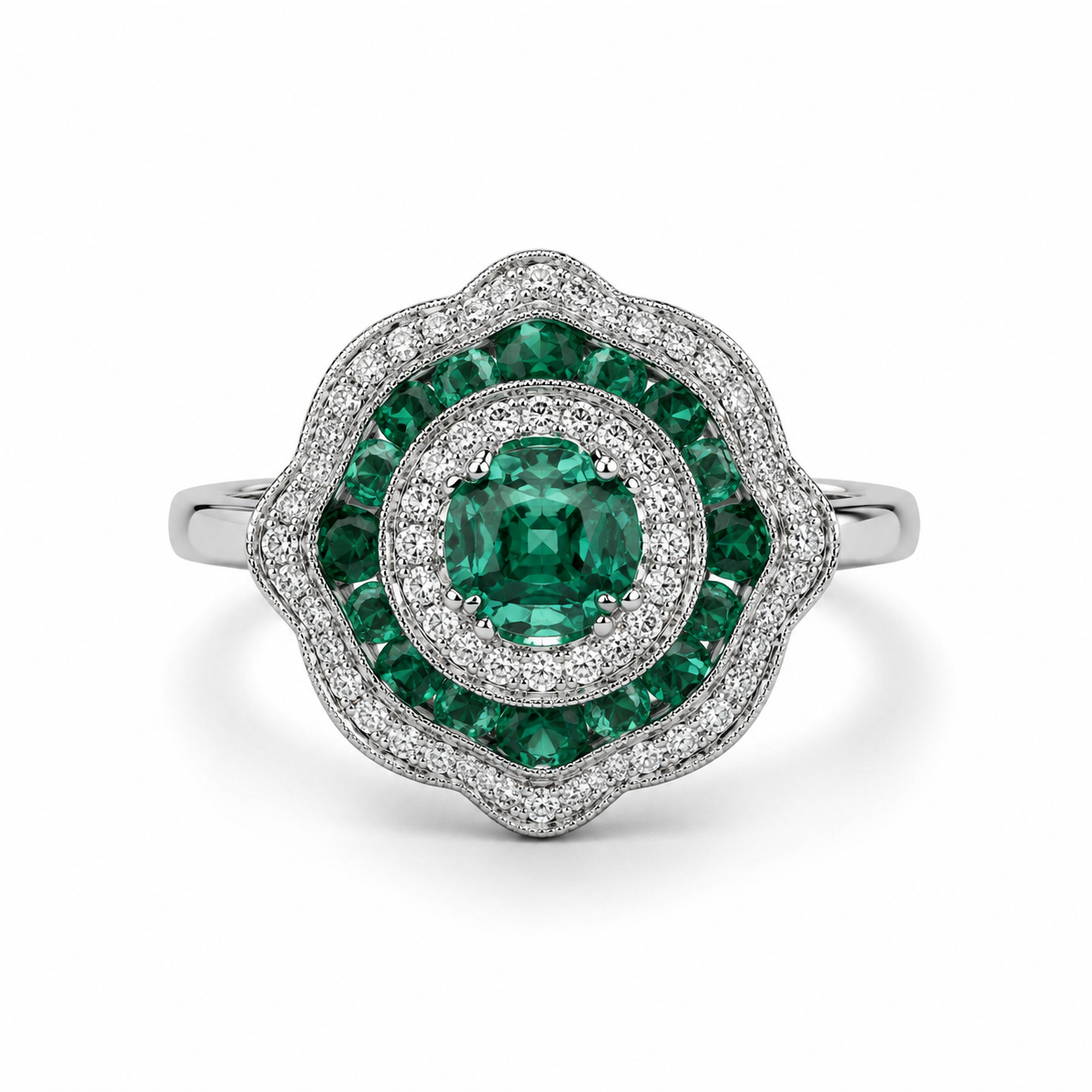 Bague en or blanc 750 avec émeraudes 0.80 carats et diamants GH SI 0.45 carats