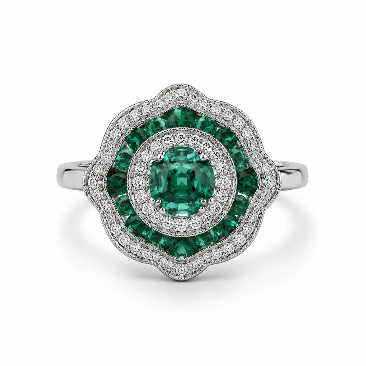 Bague en or blanc 750 avec émeraudes 0.80 carats et diamants GH SI 0.45 carats